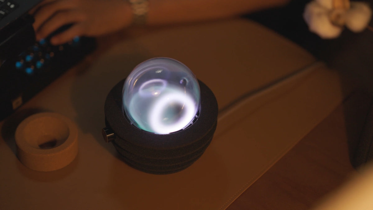 Original overhead photograph of the REAZE A300 glass sphere and light